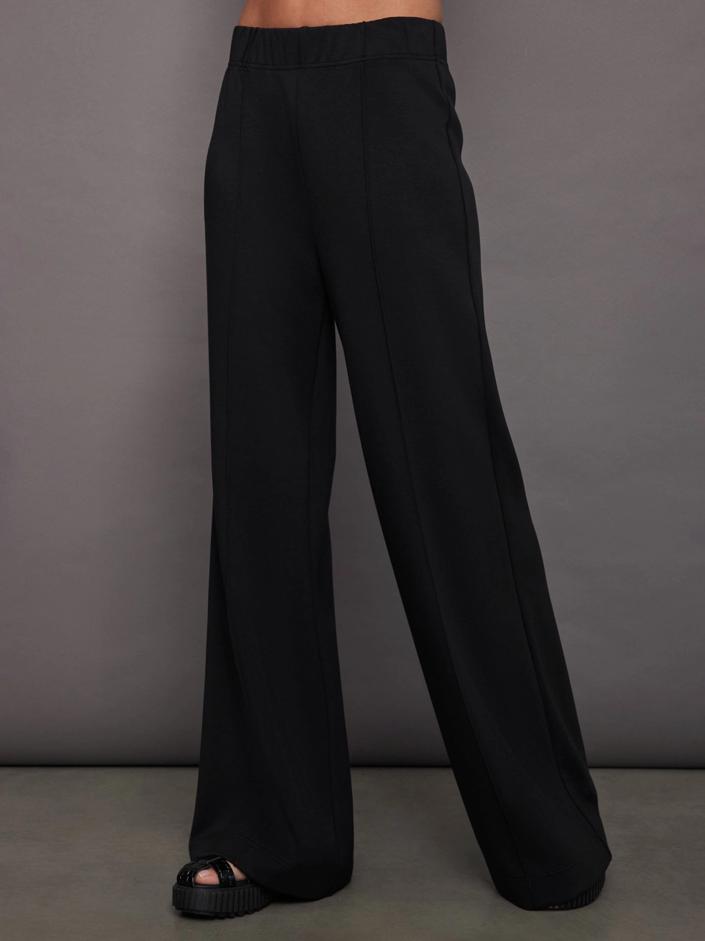 Ribbed Cuff Ankles Drop Shoulder Construction Pintuck Knit Pant in Interlock - Black